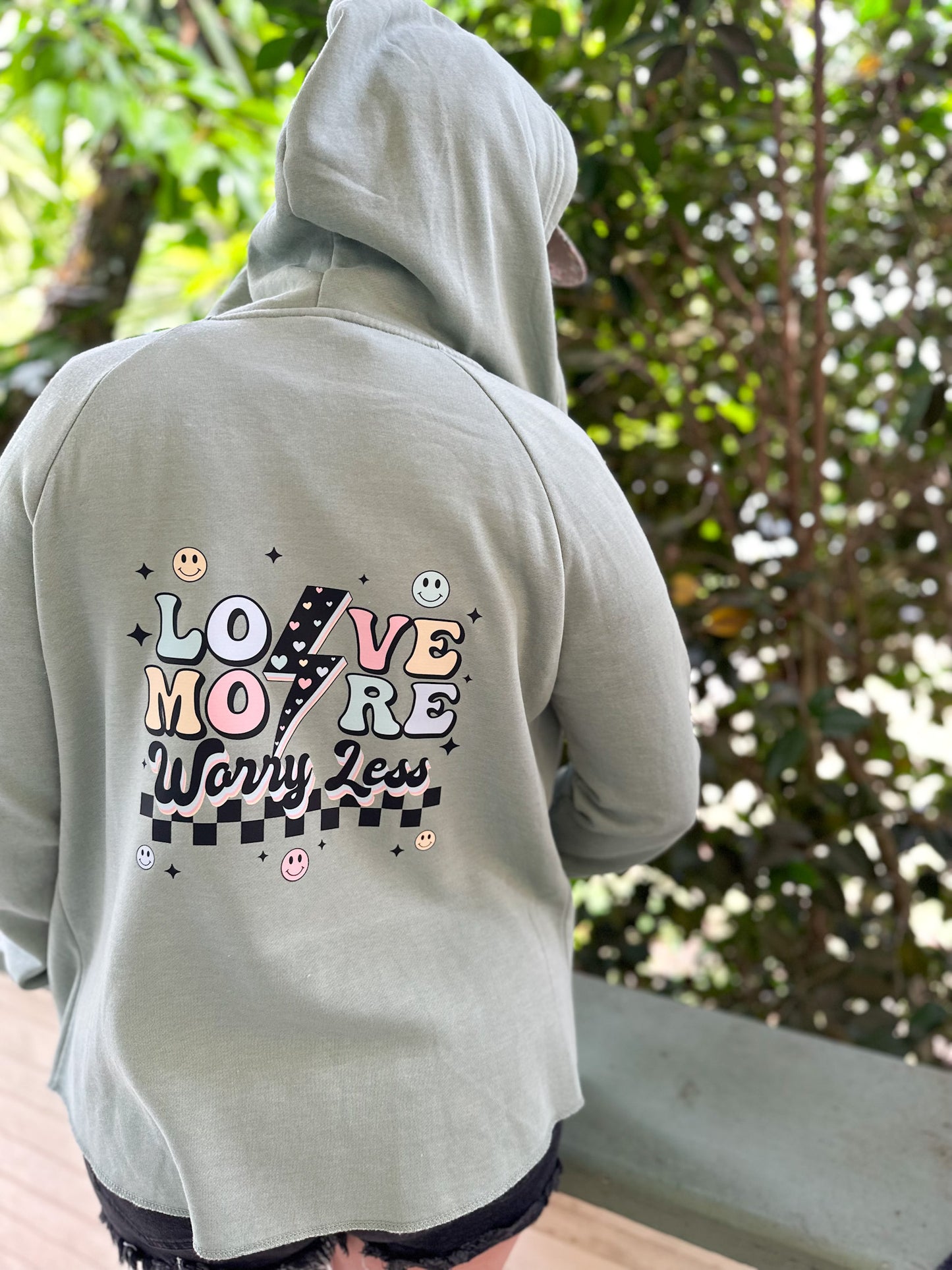 'LOVE MORE WORRY LESS' POCKET ZIP UP HOODIE