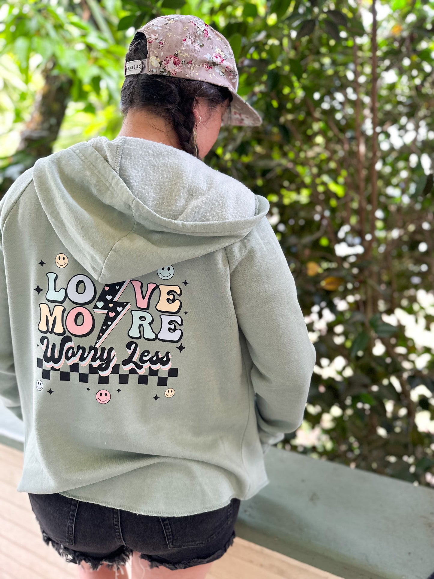 'LOVE MORE WORRY LESS' POCKET ZIP UP HOODIE